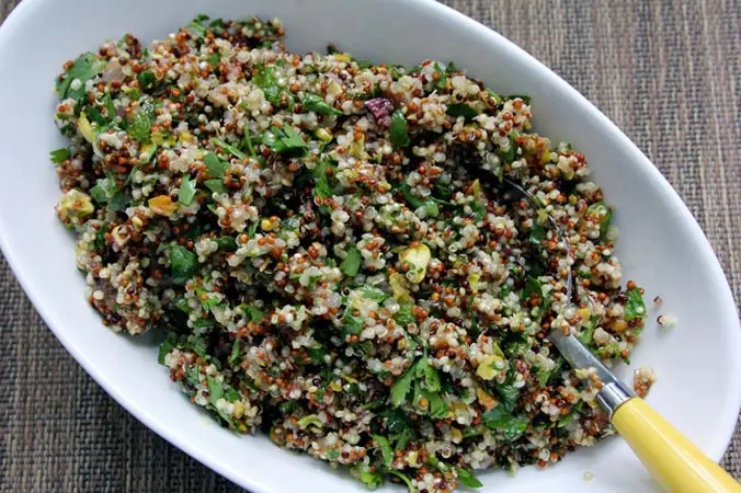 A bowl of food that is on the table.