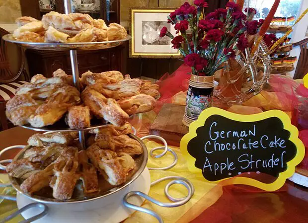 A table with several different types of pastries.