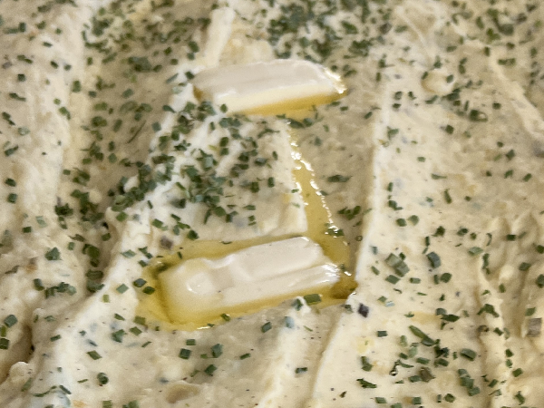 A close up of some food with cheese