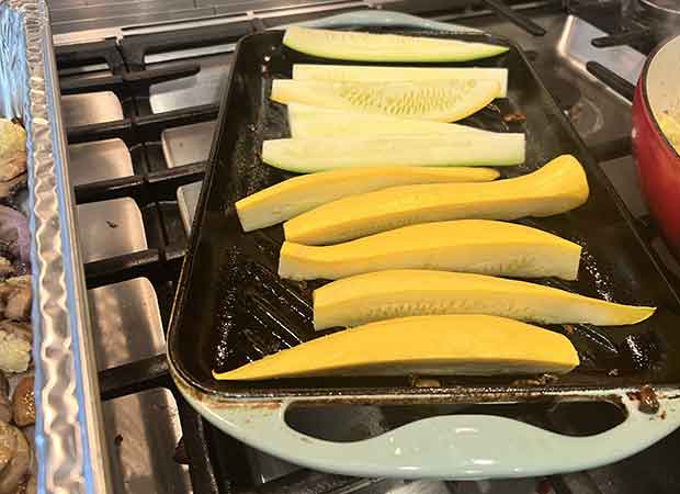 A grill with some cut up bananas on it