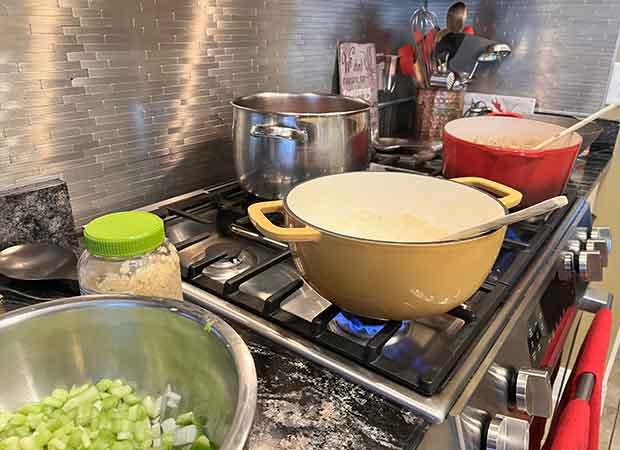 A stove with pots and pans on it