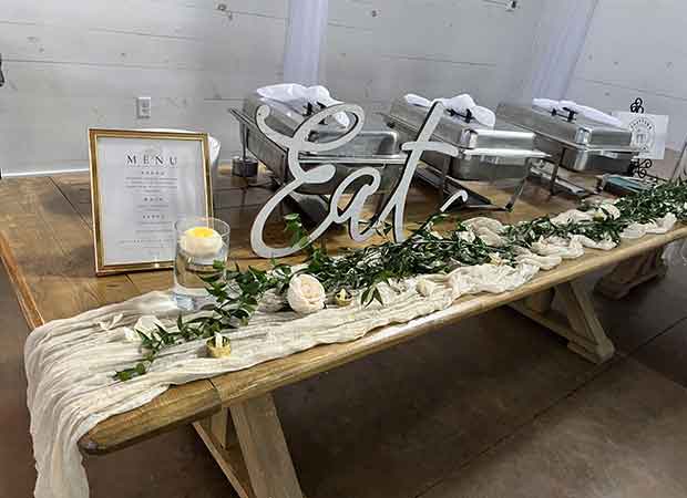 A table with a bunch of flowers on it